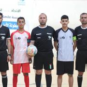 الحكم محمود أبو حصيرة على يمين الصورة
