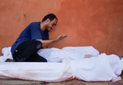 وداع مؤثر لشهداء في غزة