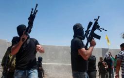 عناصر من حركة فتح خلال اطلاق النار في الهواء