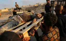 متعاقد أمني يكشف عن فظائع وجرائم بحق المجوّعين بغزة