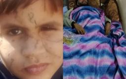 الشاب راضي إسماعيل أبو سعد و الطفل آدم أبو حليب