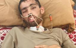 محمد أبو طه.. جريح بين الحياة والموت في ظل انهيار المنظومة الصحية بغزة