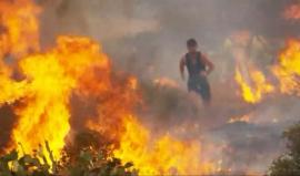 عداء يحاول إطفاء حرائق غابات بقدميه