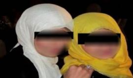 أب يذبح ابنتيه