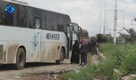 جانب من وصولي الحافلات التي تقل عائلات من بلدتي الفوعة و كفريا الى حي الراشدين في حلب بناء على اتفاق بين النظام والمعارضة .