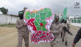 كتائب القسام تتضامن مع #حلب خلال مسير عسكري بذكرى انطلاقة #حماس بغزة 
#حلب_تباد