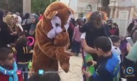 #شاهد توزيع الهدايا على الاطفال في ساحات المسجد الاقصى المبارك بذكرى المولد النبوي الشريف.