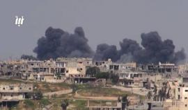 #شاهد البراميل المتفجرة تنهال على أحياء درعا البلد