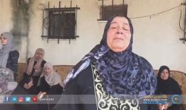 والدة الشهيد عمر نصار الفليت في وداع ابنها الذي ارتقى في النفق الذي استهدفه الاحتلال شرق دير البلح