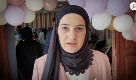 نساء فلسطينيات يشاركن في معرض للمنتجات اليدوية في قرية صوريف شمال الخليل