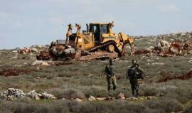 الاحتلال يجرّف أرضاً بالقدس ومستوطنون يسيجون مساحات واسعة في الأغوار  _أرشيفية_