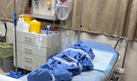 جثمان أحد شهداء مجزرة العائلة بطمون