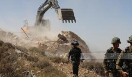 قوات الاحتلال تنفذ عمليات هدم وتجريف في جنين ورام الله والخليل