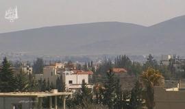 مشهد عنيف.. برميل متفجر يسقط أمام عدسة كاميرا في مخيم خان الشيح بريف #دمشق