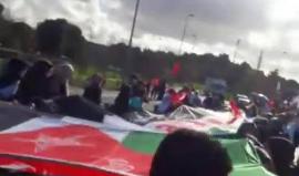 مجموعة الشباب فلسطيني تشارك مؤسسات تركية في مارثون باسطنبول رافعين العلم الفلسطيني فوق جسر البسفور (جسر الخامس عشر شهداء تموز)