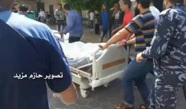 #شاهد لحظة وصول الشهيد "محمود يحيى حسين" 25 عاما سكان البريج الى مستشفى شهداء الأقصى