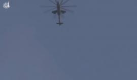 لحظة إلقاء الطيران المروحي ثلاثة براميل متفجرة على خان الشيح في ريف دمشقمركز خان الشيح الإعلامي