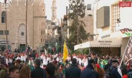 #شاهد #مباشر بدء احتفالات أعياد الميلاد في بيت لحم تحت شعار " #القدس_عاصمة_فلسطين 
 "