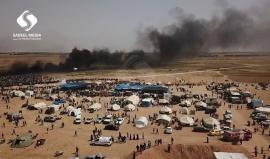 #شاهد تصوير جوي لفعاليات الجمعة الثالثة من #مسيرة_العودة_الكبرى شرق محافظة خانيونس جنوب قطاع غزة .