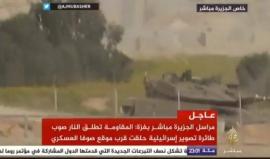 #شاهد لحظة تسلل عدة شبان من قطاع غزة لحفار إسرائيلي يستخدم للبحث عن الأنفاق  ويشعلون النار فيه وينسحبون من المكان بعد اجتياز السلك الإلكتروني الفاصل.