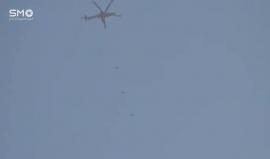 #شاهد كيف تتساقط البراميل المتفجرة في مدينة #داريا السورية من قبل الطيران الحربي