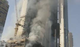 #شاهد حريق في برج قيد الإنشاء بدبي