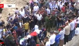 جانب من تشييع جثمان الشهيد الأسير المحرر نعيم  الشوامرة في مدينة دورا بالخليل والذي ارتقى أمس متأثرا بأمراض أصابته نتيجة الإهمال الطبي في سجون الاحتلال