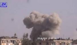 #شاهد لحظة تعرض حي مساكن هنانو في حلب للقصف من الطيران الحربي صباح اليوم

تصوير: حلب 24