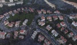 تصوير جوي يظهر آثار موجة الحرائق التي ضربت مدينة #حيفا المحتلة