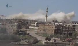 شاهد براميل متفجرة تنهمر على أحياء درعا البلد صباح اليوم