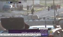 #شاهد | لحظات رعب بين المدنيين وإصابة نازحة جراء الاشتباكات بين الجيش العراقي و #تنظيم_الدولة غربي #الموصل