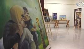 ‫ألوان خلف الجدران.. معرض فني يلخص عذابات الشعب الفلسطيني منذ عقود