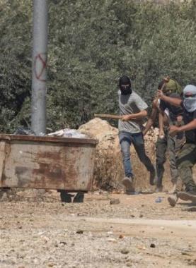 مستوطنون يعتدون على مواطنين في الضفة الغربية _أرشيفية_