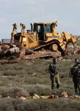الاحتلال يجرّف أرضاً بالقدس ومستوطنون يسيجون مساحات واسعة في الأغوار  _أرشيفية_