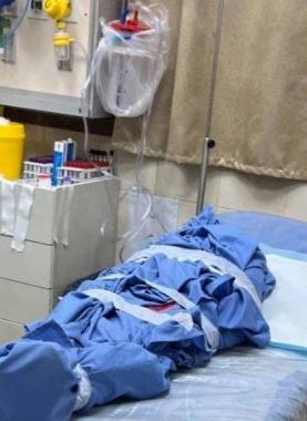 جثمان أحد شهداء مجزرة العائلة بطمون