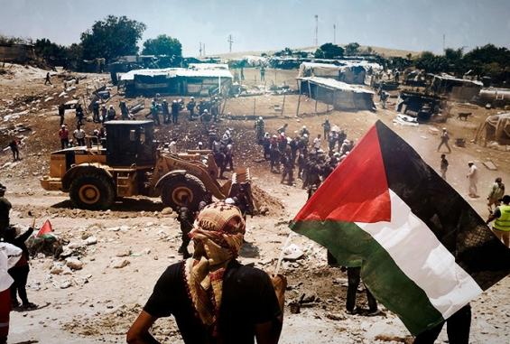 صورة أرشيفية-مواجهات خلال محاولة اخلاء الخان الأحمر