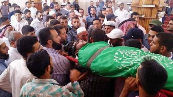 الآلاف يشيعون جثماني شهيدين من القسام بغزة