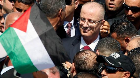 لحظة وصول حكومة الوفاق برئاسة رامي الحمد الله لقطاع غزة