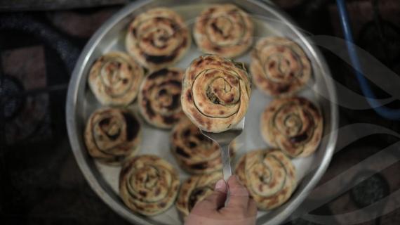الأكلة الشعبية الفلسطينية "فطائر السبانخ" المشهورة في فصل الشتاء.